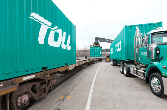 Unloading containers from a Toll truck