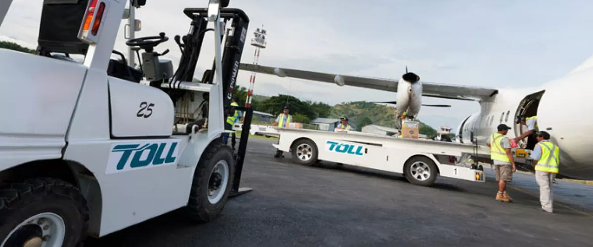 Unloading an aircraft in East Timor